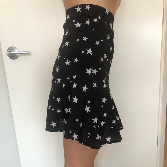 Mini black flare skirt with stars - Picture 5 of 6